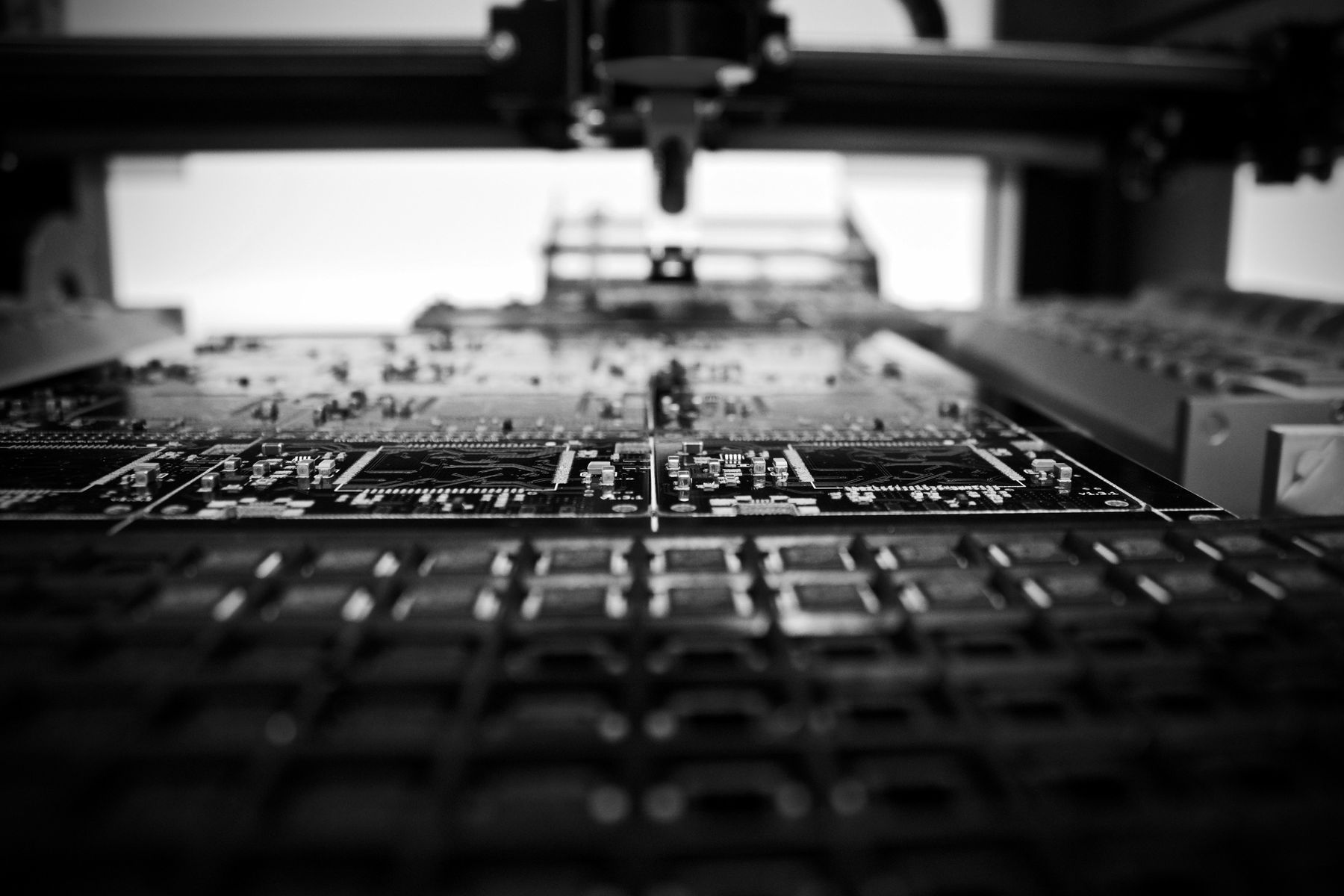 Electronics manufacturing — close-up of a populated PCB