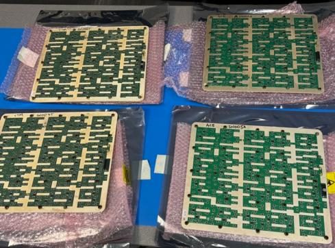 Production panels staged for automated test.