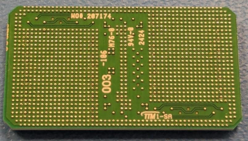 MicroModule underside — ultra-fine-pitch BGA super-assembly with on the order of 1,000 solder balls for DC–100 GHz interconnection.
